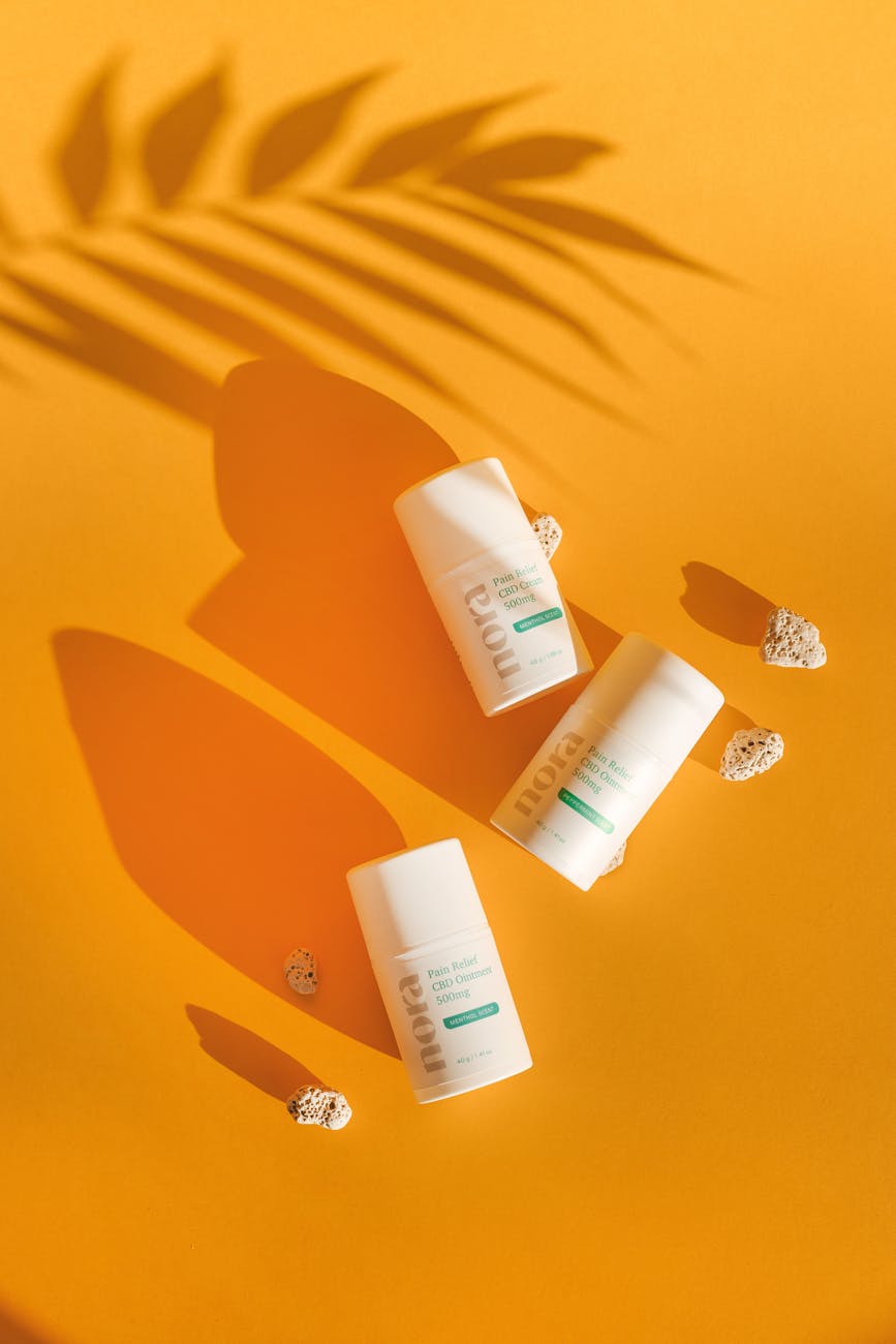 beauty products on orange background
